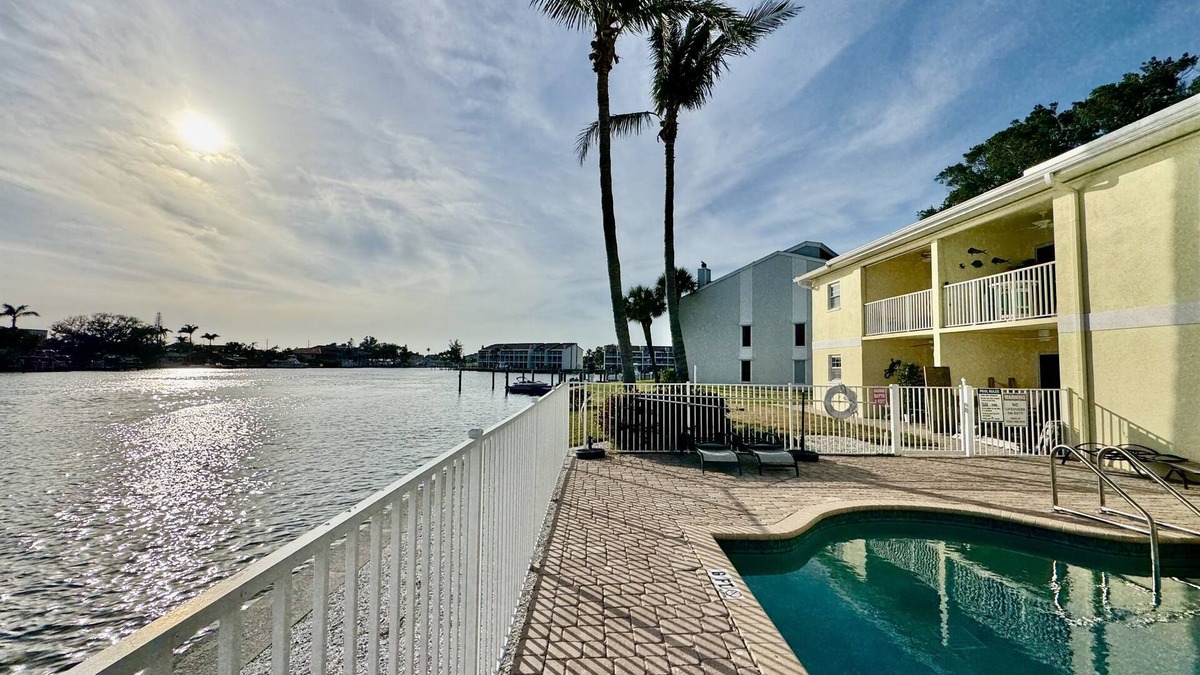 Capri Isle Condo | Canal-View Gem w/Pool in Treasure Island Paradise