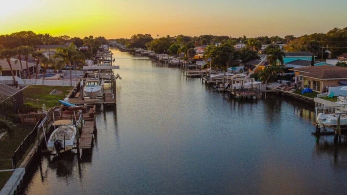 Bay Crest Park House | Canal views, dock, MANATEES, pool and more!
