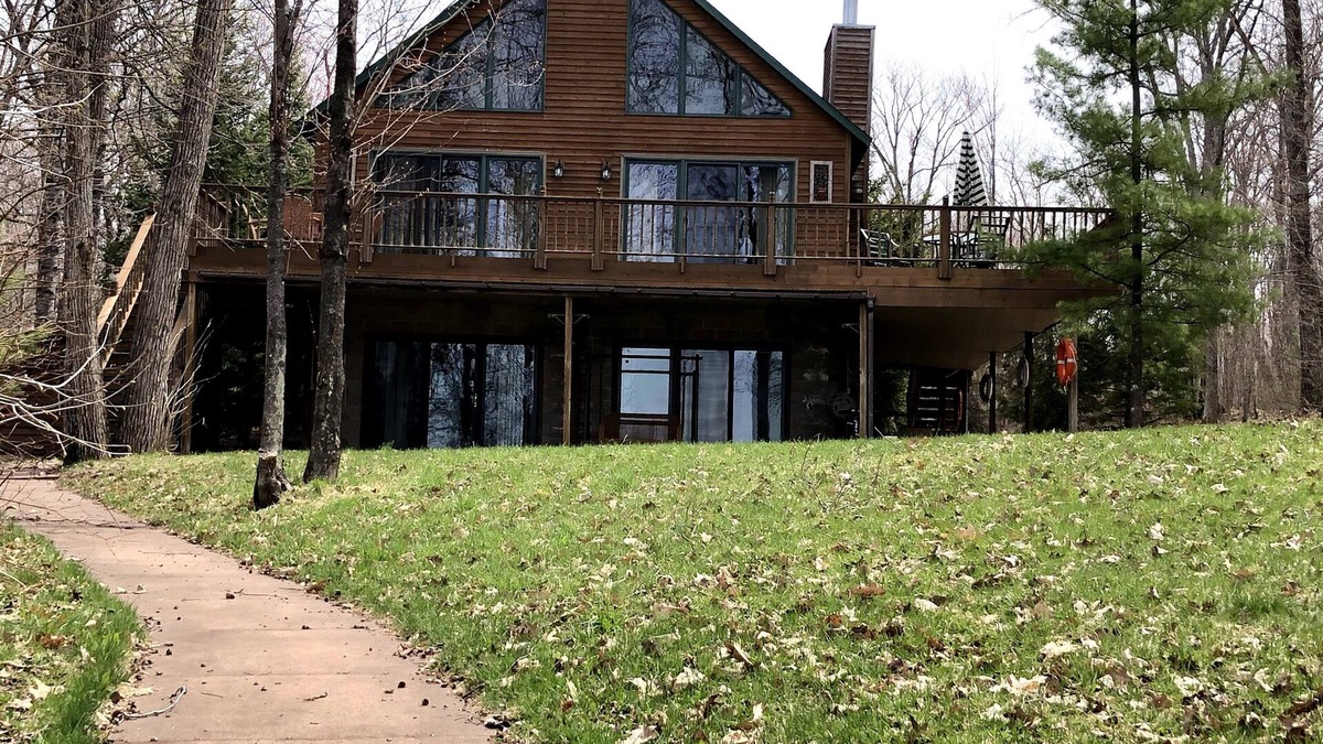 Chief Lake Cabin | Captivating Views of Lake Chippewa from Three Level Chalet Cabin & Lake Home