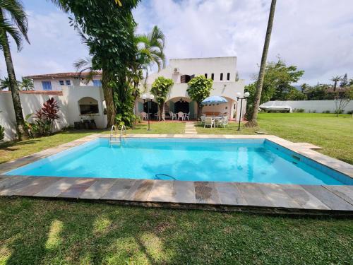 Jardim Virginia House | Casa Enseada 4 suites , 2 quadras do mar local nobre