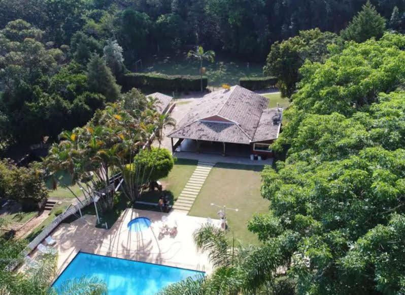 Jardim Primavera House | Casa Guacuri - Casa de temporada e eventos - apartamentos com suítes - Piscinas e Amplo Estacionamento
