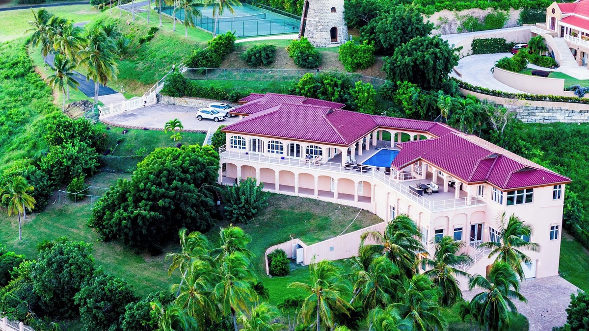 Testman Villa | Castaway Dreams 20 person Villa with Boat, Pool, Tennis Court, and Sugar Mill
