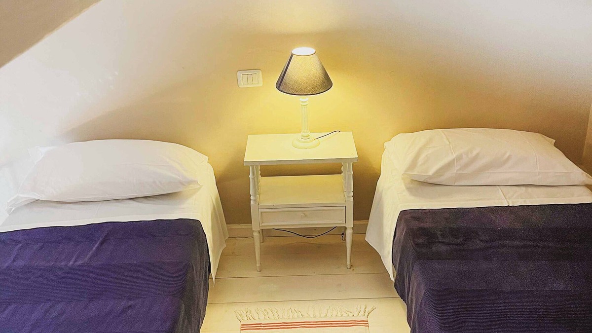 Torre de' Passeri Apartment | "Castle" apartment with one double room and two single beds