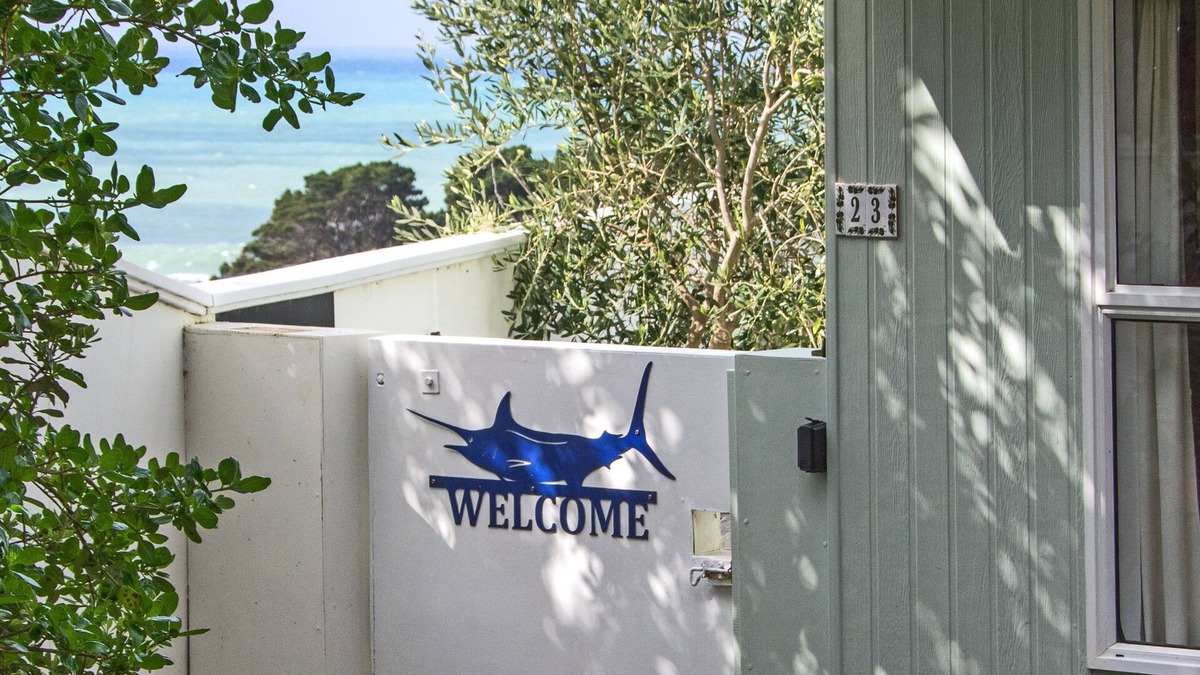 Castlepoint House | Castlepoint - Private family beach home with stunning views capturing the sun.