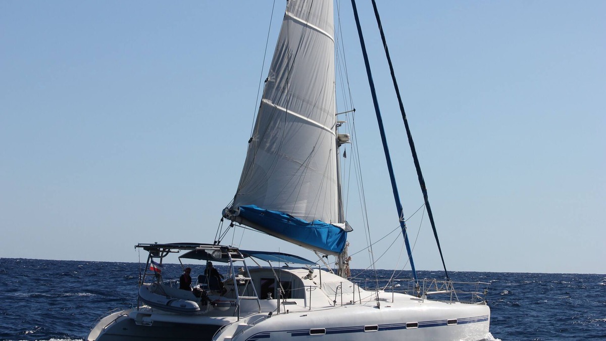 Vlychada Boat Rental | Catamaran cruise with skipper and hostess