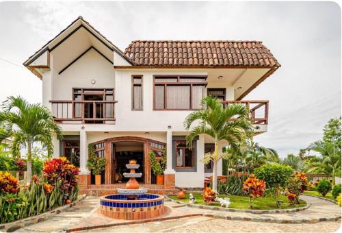 Quimbaya House | Cattleya tropical