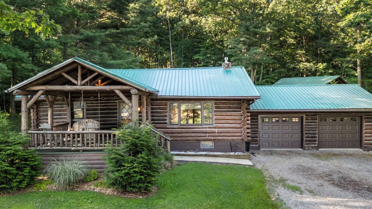Town of Milo House | Cedar Lane Cabin: Authentic log cabin in wooded setting overlooking rural farmland