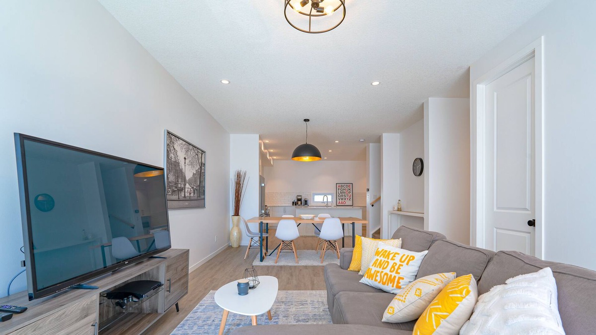 Bridgeland House | Central, Family-sized 3 BR Townhome with AC, Work Space & Private Parking