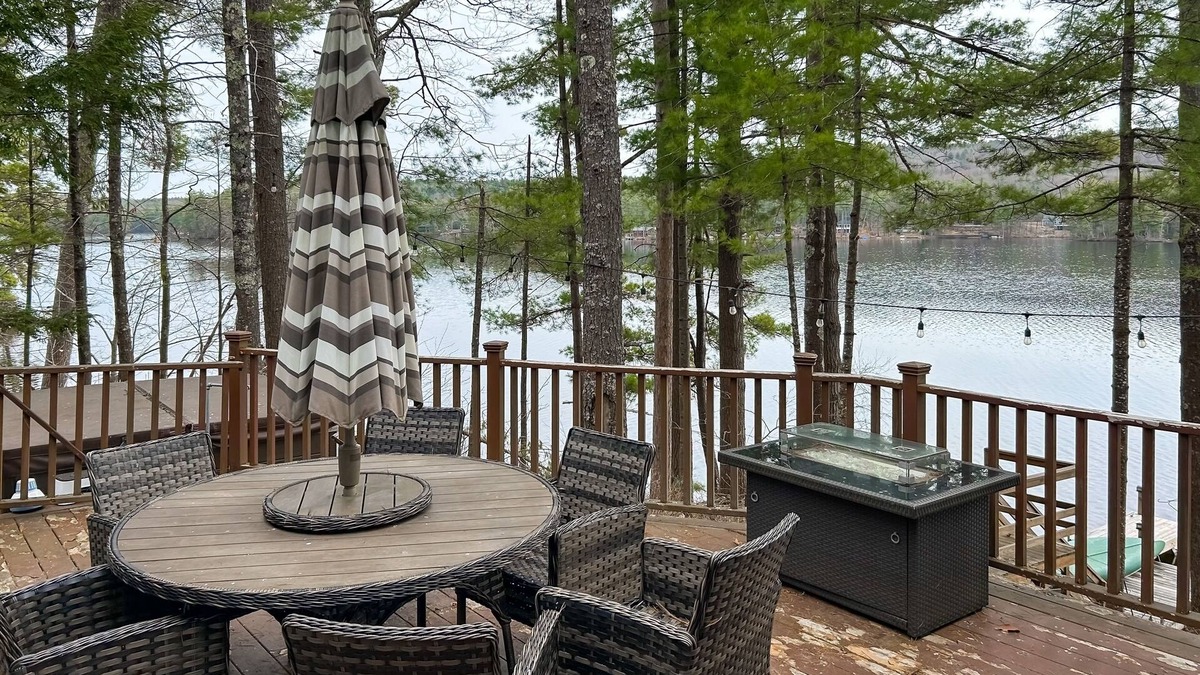 Pine River Pond House | Central lakefront house with private hot tub, dock, patio bar, & beach access
