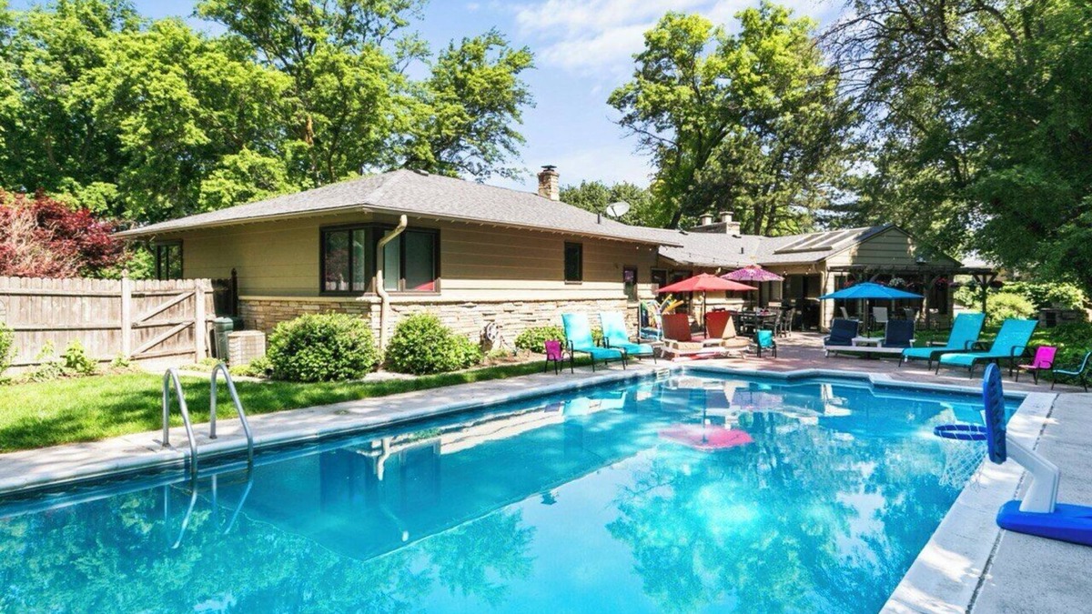 West Omaha House | Central Omaha Pool w/Spa Oasis + Fire Pit + 3 Living Rooms