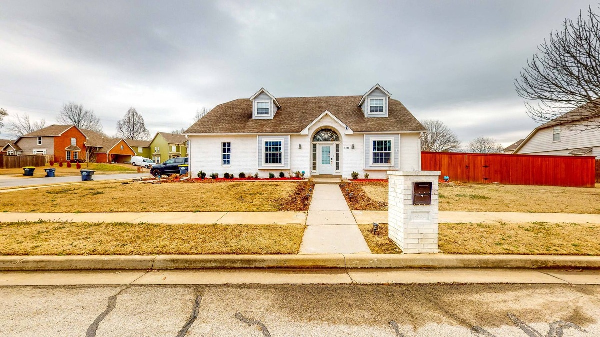Jenks House | Centrally located home w/ a wood-burning fireplace
