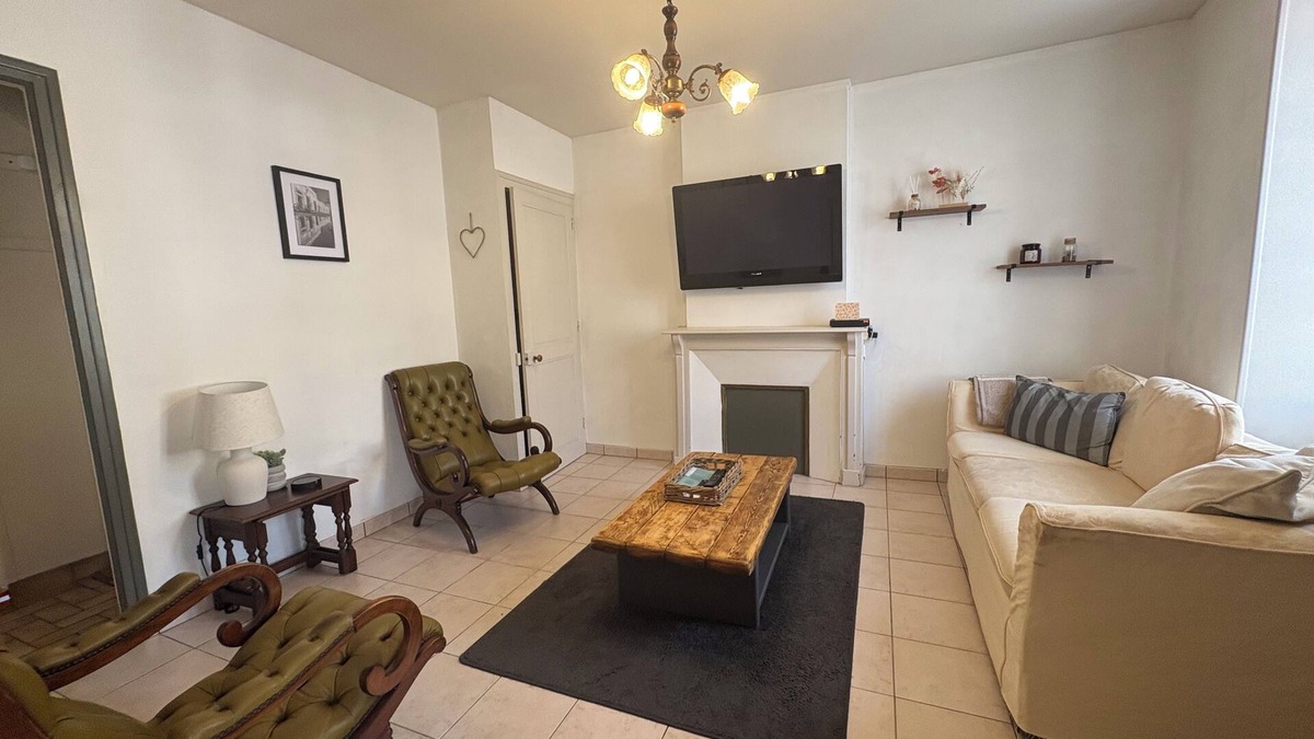 Le Dorat House | Centrally located in a beautiful town, private garden & parking