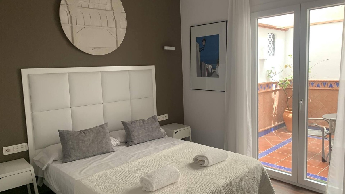 Centro - Sagrario Apartment | Centrally located, with free car park and patio