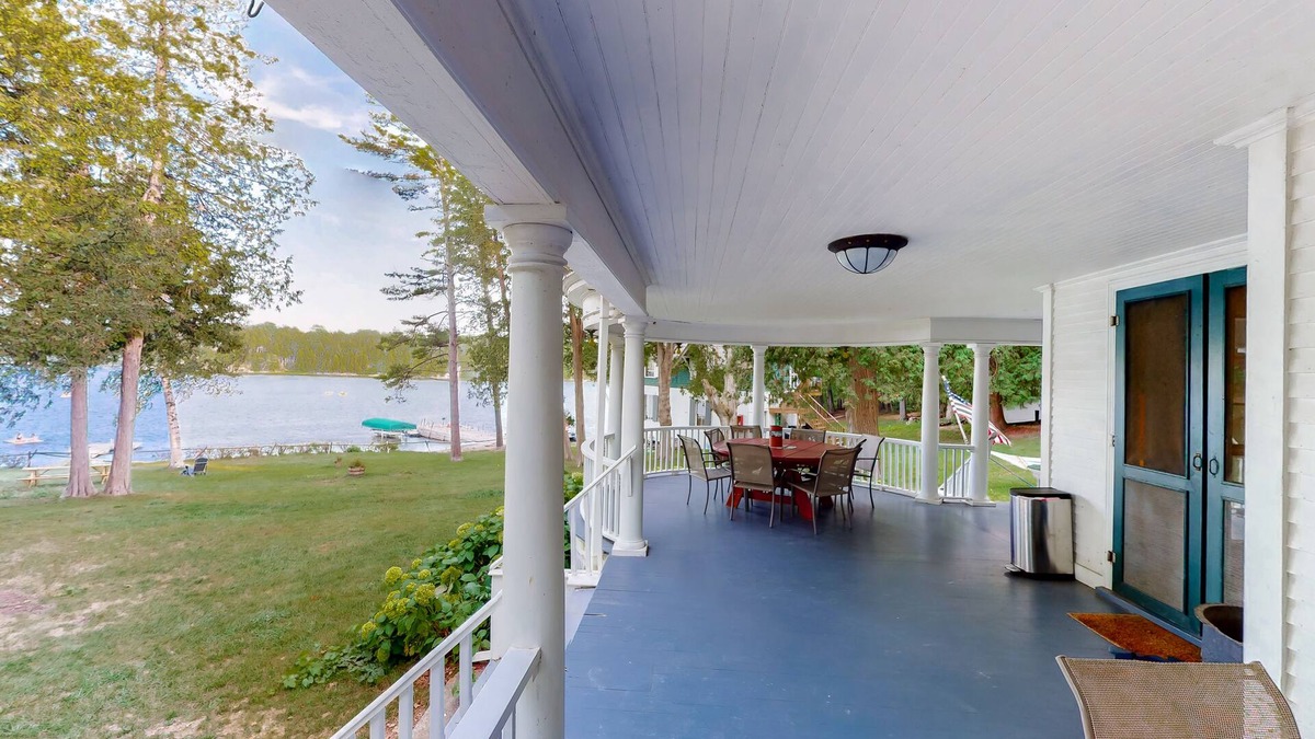 Charlotte Cottage | Century-old lakefront Victorian on a private island with boats & beach - dogs OK