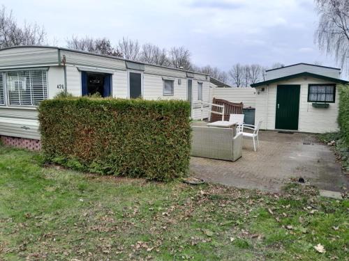Schoonloo Ski Chalet | Chalet 426 met airco familiecamping de Tien Heugten Schoonloo Drenthe