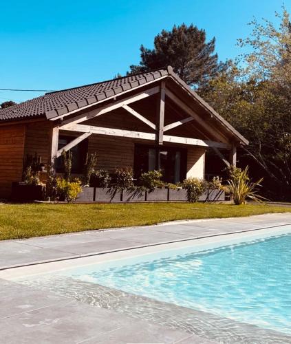 Saint-Aubin-de-Medoc Ski Chalet | CHALET ARIZONA - AU COTTAGE DU MEDOC - Proche de BORDEAUX
