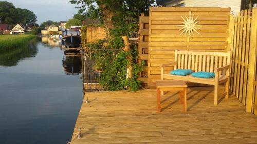 Onderdijk Apartment | Chalet direkt an der Gracht mit eigenem Bootsanlegesteiger