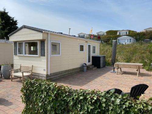 IJmuiden Ski Chalet | Chalet Ibiza in de duinen van IJmuiden aan Zee