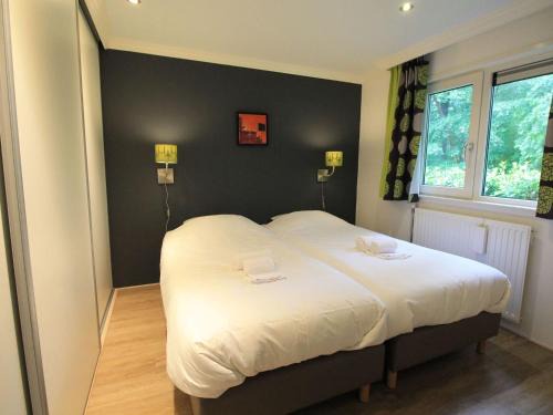 De Bult Ski Chalet | Chalet in Overijssel by Sunny Pond