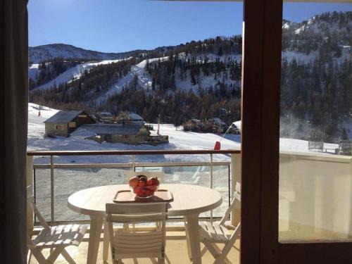 Isola Apartment | Chaleureux 3 pièces 50m² plein sud avec grande terrasse au pied des pistes à Isola 2000