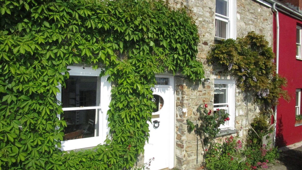 St Dogmaels Cottage | Character cottage in heart of village with stunning estuary view and garden