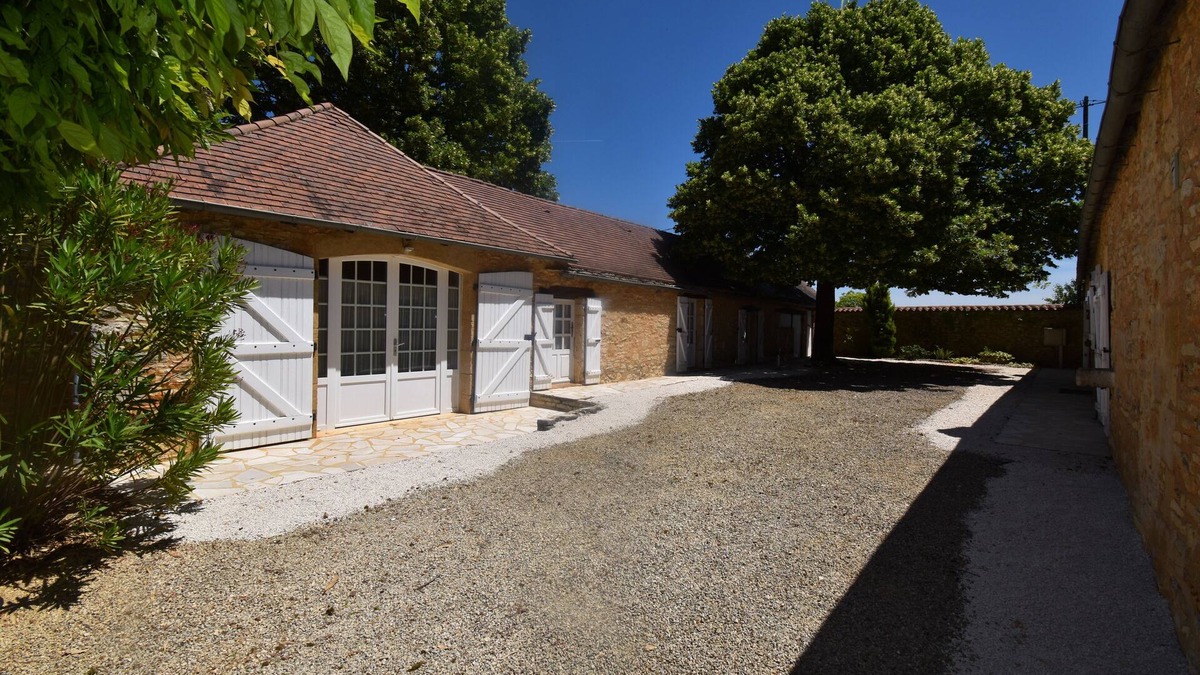 Saint-Laurent-la-Vallee Cottage | Charming stone house with shared, heated swimming pool and landscaped park
