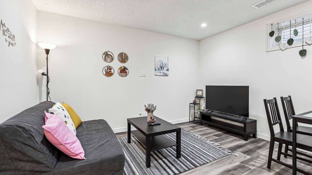 Cranston House | Charming 1BR Basement Suite w Parking—Calgary