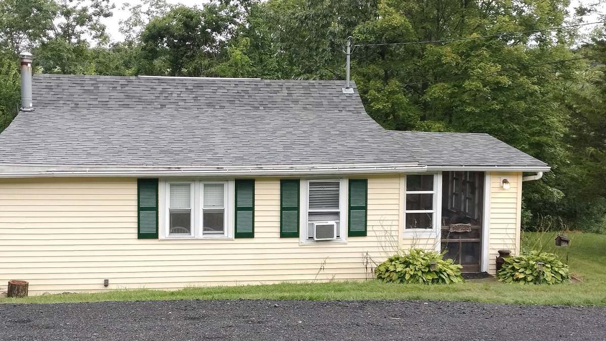 Fishertown Cottage | Charming 2-bedroom cottage near Bedford, screened porch deck & private setting