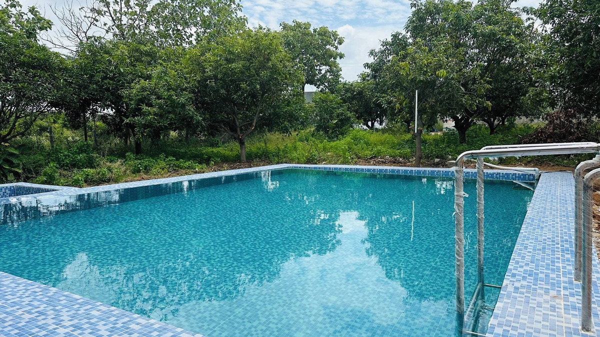 Bhongir Other | Charming 2-bedroom farmhouse with pool,AC, in Bibinagar in a 5 acre Mango farm