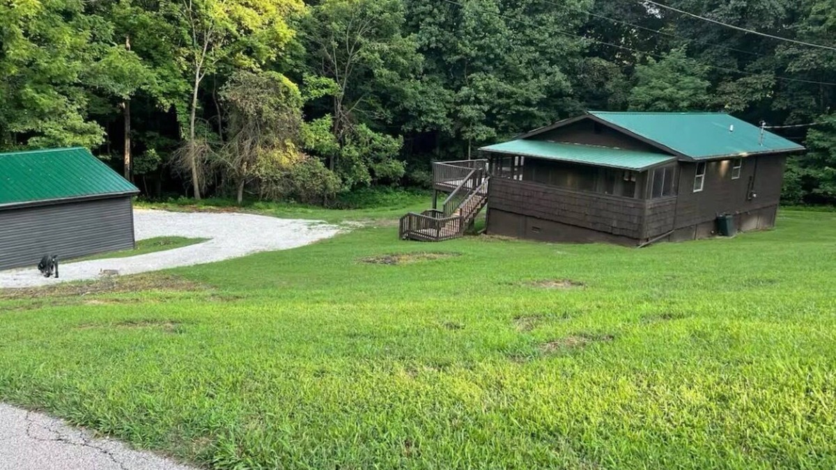 Raceland House | Charming 2-bedroom house located in beautiful wooded setting!