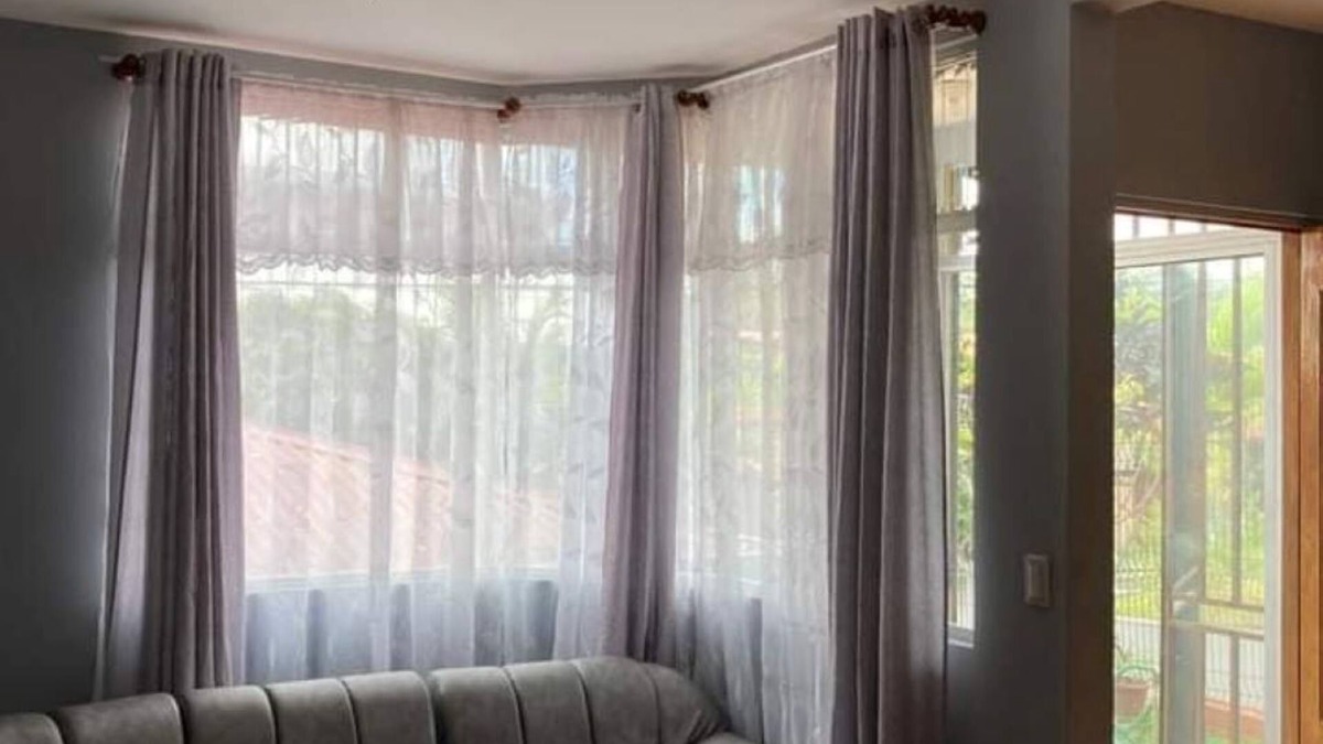Grecia House | Charming 2-bedroom house with AC and WiFi in a quaint neighborhood.
