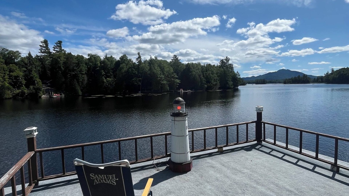 Saranac Lake Cabin | Charming 2-bedroom cabin on the water! Featuring boathouse and dock Saranac Lake