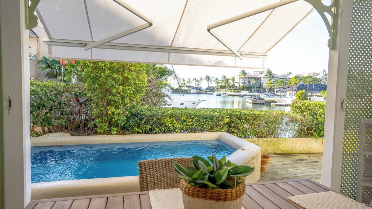 Douglas Villa | Charming 2-brm WATERFRONT Villa with WiFi, AC, & Pool in PORT ST CHARLES MARINA!