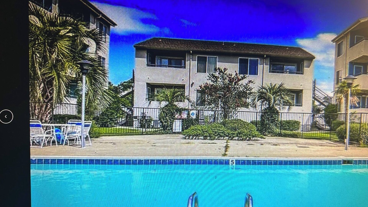 Slidell Condo | Charming 2Bd. waterfront living, pool, fitness rm. in serene Slidell