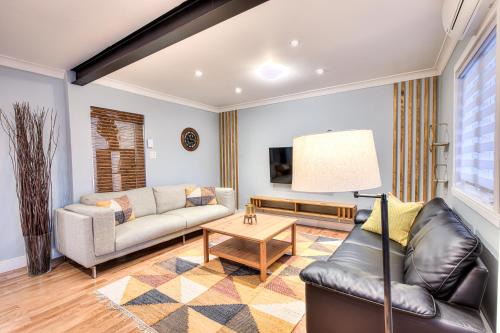 Cote-Des-Neiges—Notre-Dame-De-Grace Apartment | Charming 2BR with Balcony in Montreal