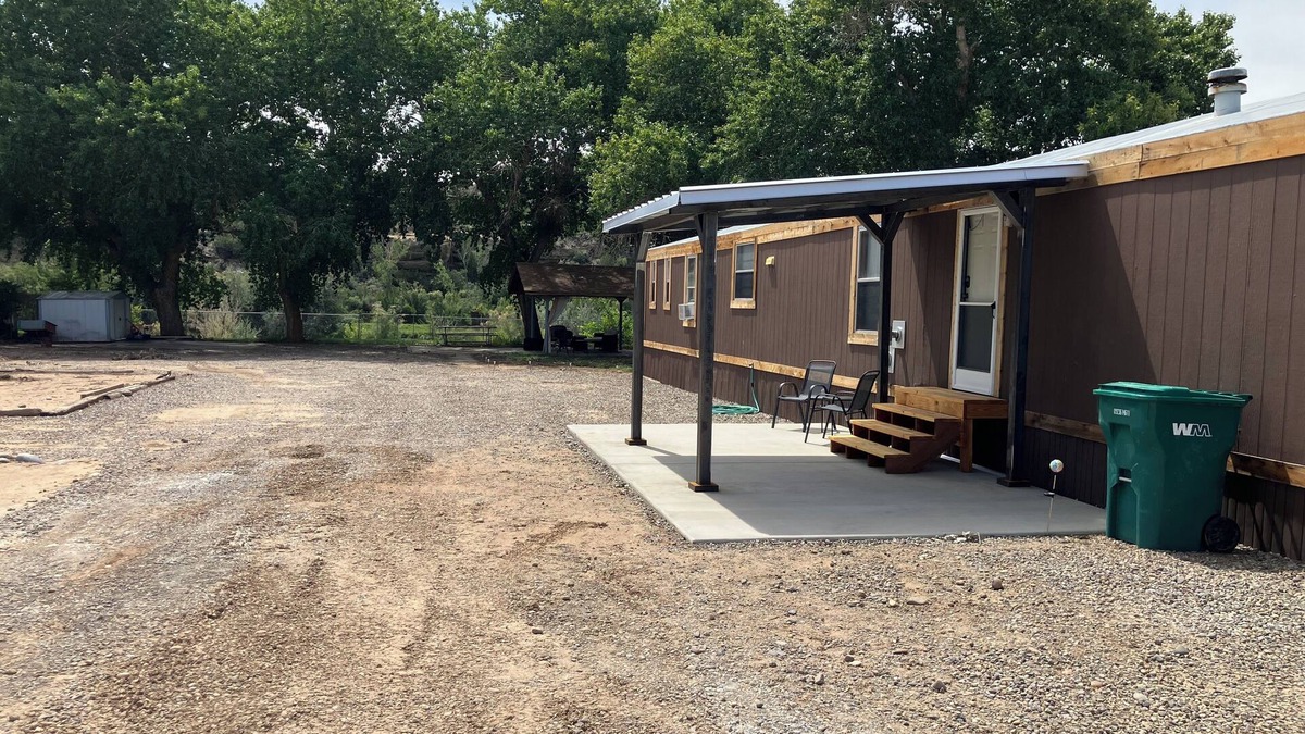 Navajo Dam House | Charming 3-bedroom home on San Juan River, access to river within feet of door.