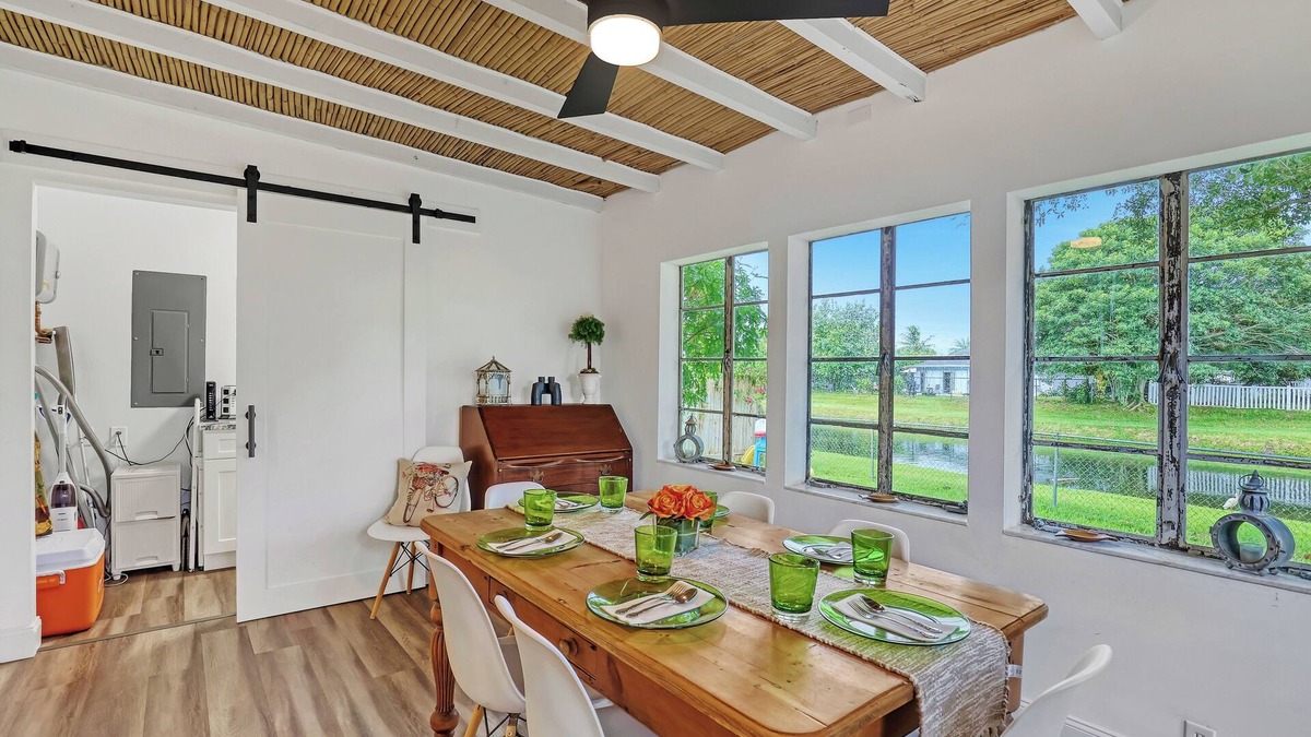 Florida North Atlantic Coast House | Charming 3BR Canal Home w/patio dining, Fire Pit & Workspace