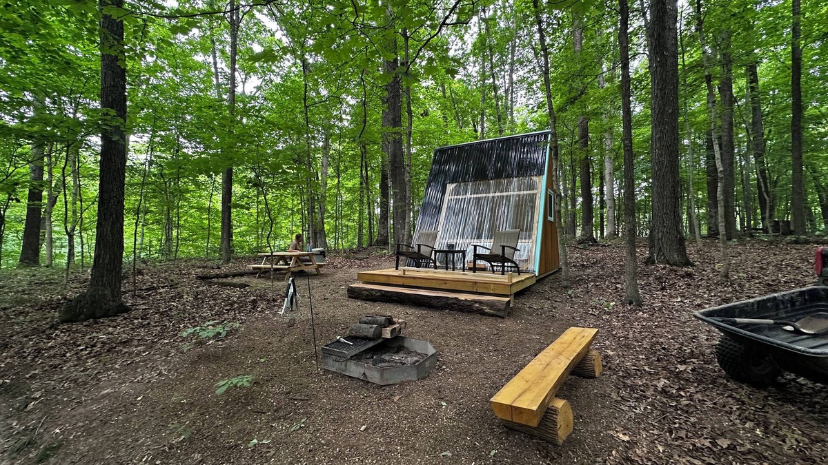 Janesville Cabin | Charming A-frame cabin set in the woods overlooking deep wooded ravines.