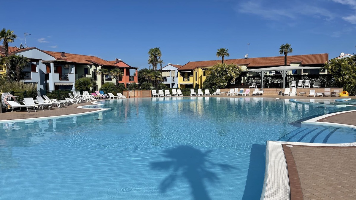 Aprilia Marittima Apartment | Charming apartment with private garden and swimming pool in Aprilia Marittima