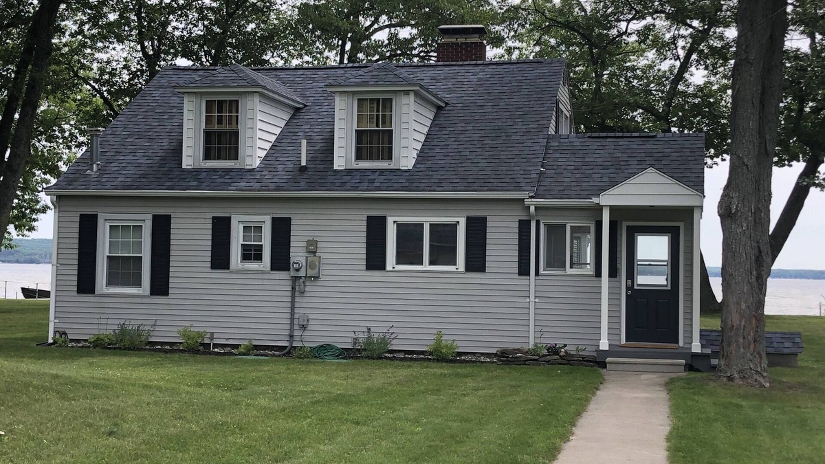 Cheboygan House | Charming Black Lakefront Cottage w/Pickleball Court-Summer weeks still available