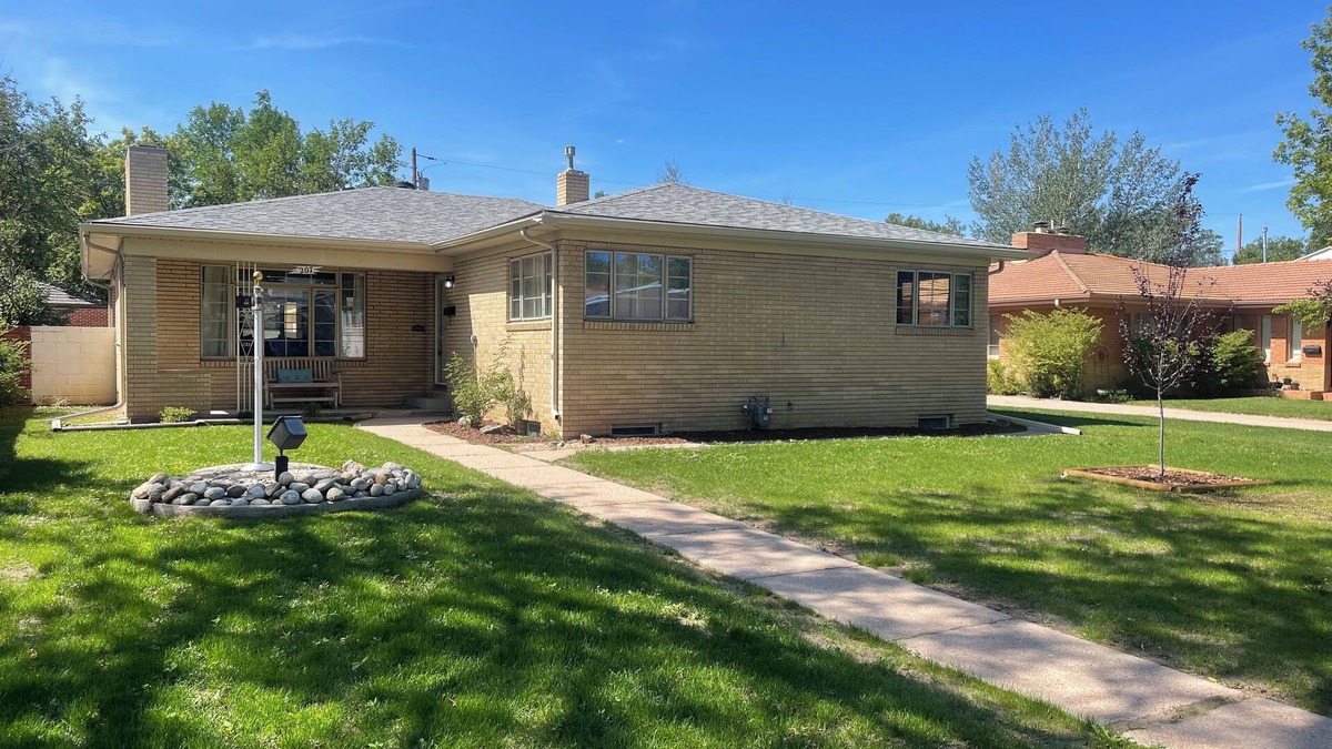 Cheyenne House | Charming brick home in The Avenues just a few blocks to Frontier Park.