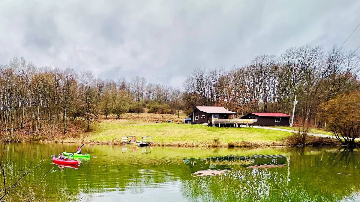 Coshocton Cabin | Charming Cabin Getaway with Pond, Kayaks + Creek