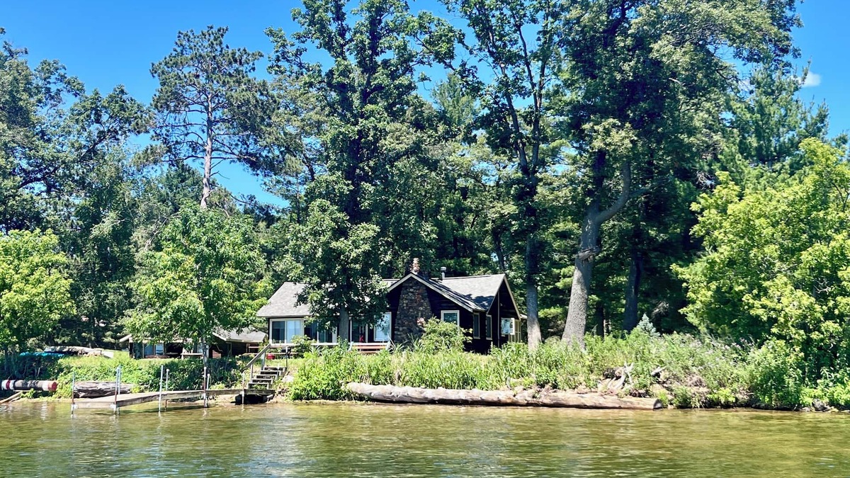 Spooner House | Charming Cabin with Beautiful Spooner Lake Front