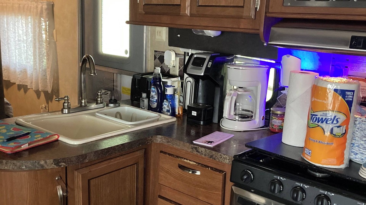 Greenbush RV Rental | Charming camper within Trails End ChinoteagueBay Resort in Horntown VA