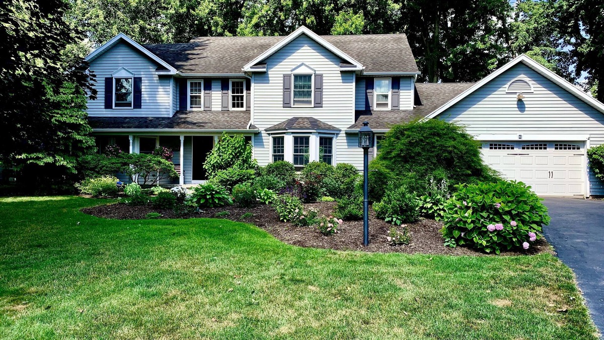 Perinton House | Charming, comfortable and spacious Pittsford home on a pond.