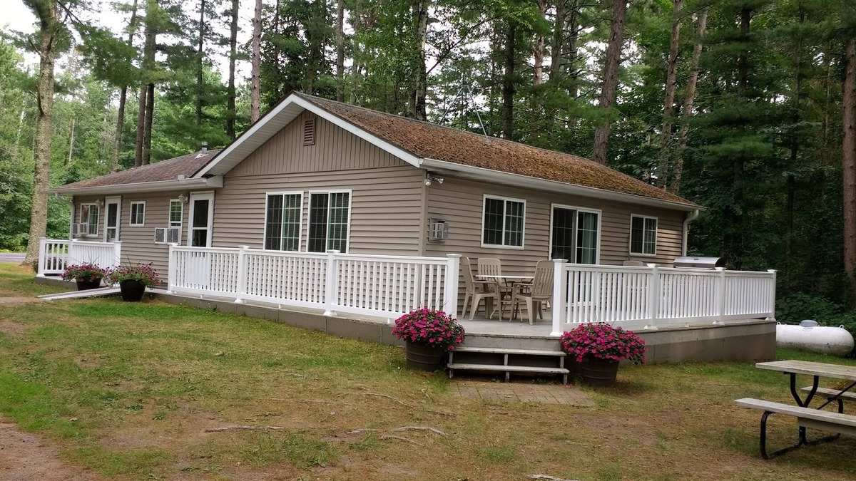 Stone Lake Cabin | Charming cottage on Long Lake; Golf course nearby, Ski & ATV trails