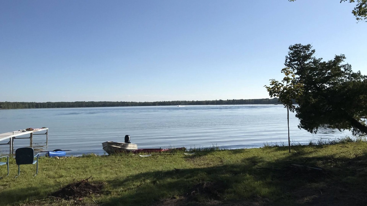 Kewadin House | Charming cottage right on the lake, newly remolded and landscaped.