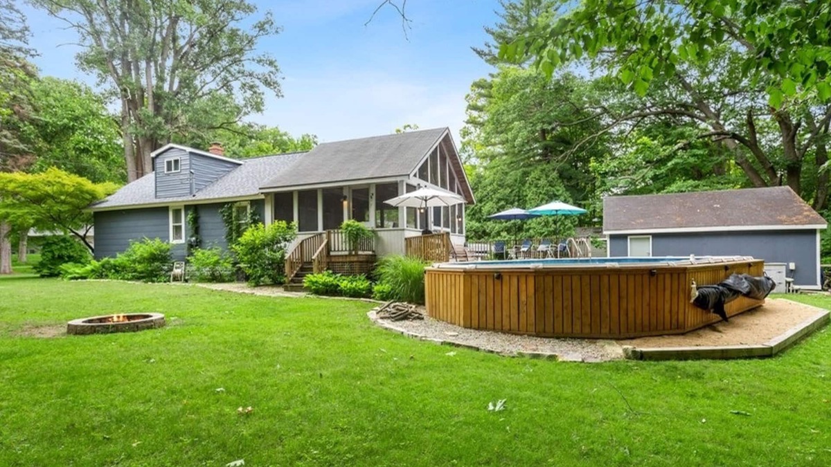 New Buffalo Cottage | Charming cottage with fast WiFi, fire pit, above-ground pool, & huge sunroom