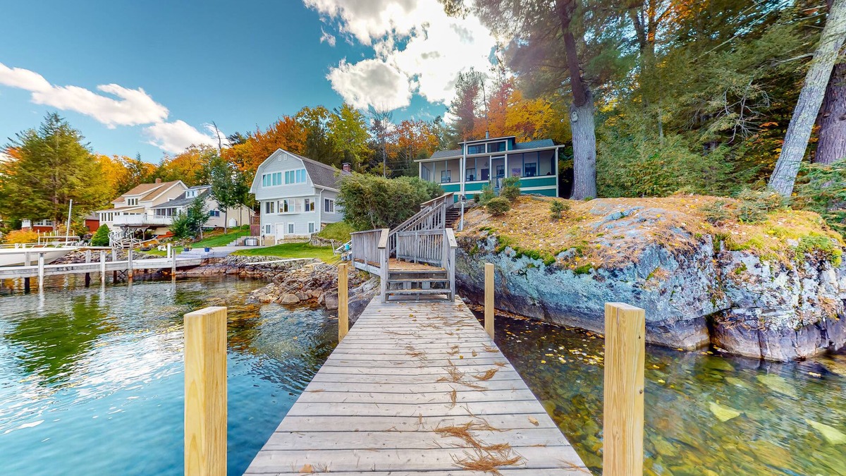 West Alton Cottage | Charming dog-friendly lakefront cottage with private dock & community beach