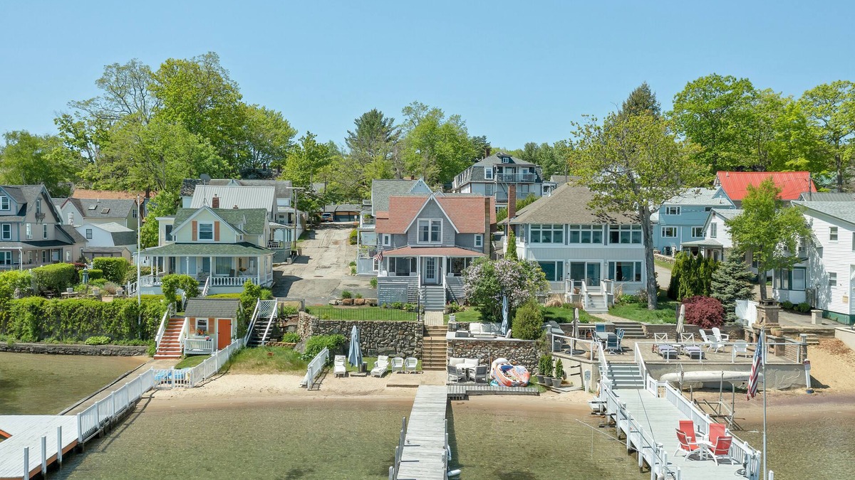 Weirs Beach House | Charming Lakefront Cottage Nearby to the Weirs with dock and sand beach